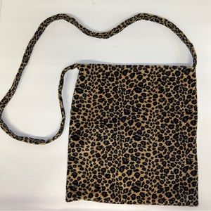 Leopard crossbody tote bag.